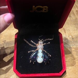 JCB Gold and Black Insect Pendant Necklace